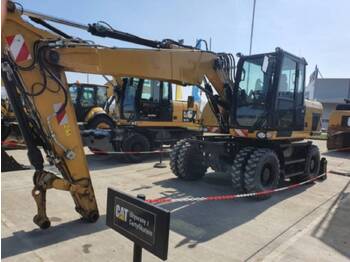 Колёсный экскаватор CATERPILLAR M313D