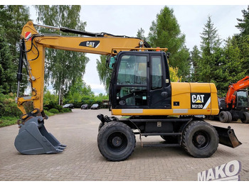 Колёсный экскаватор CATERPILLAR M313D