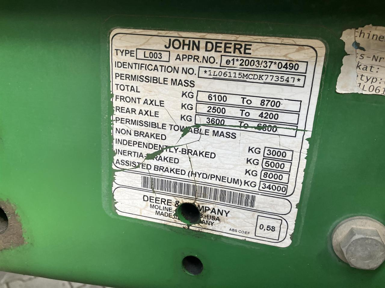 Трактор John Deere 6115M: фото 9